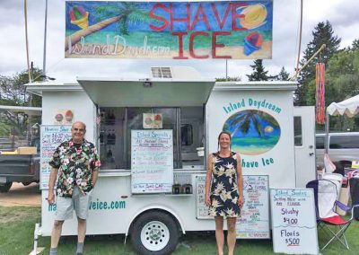 owners with island daydream shave ice trailer